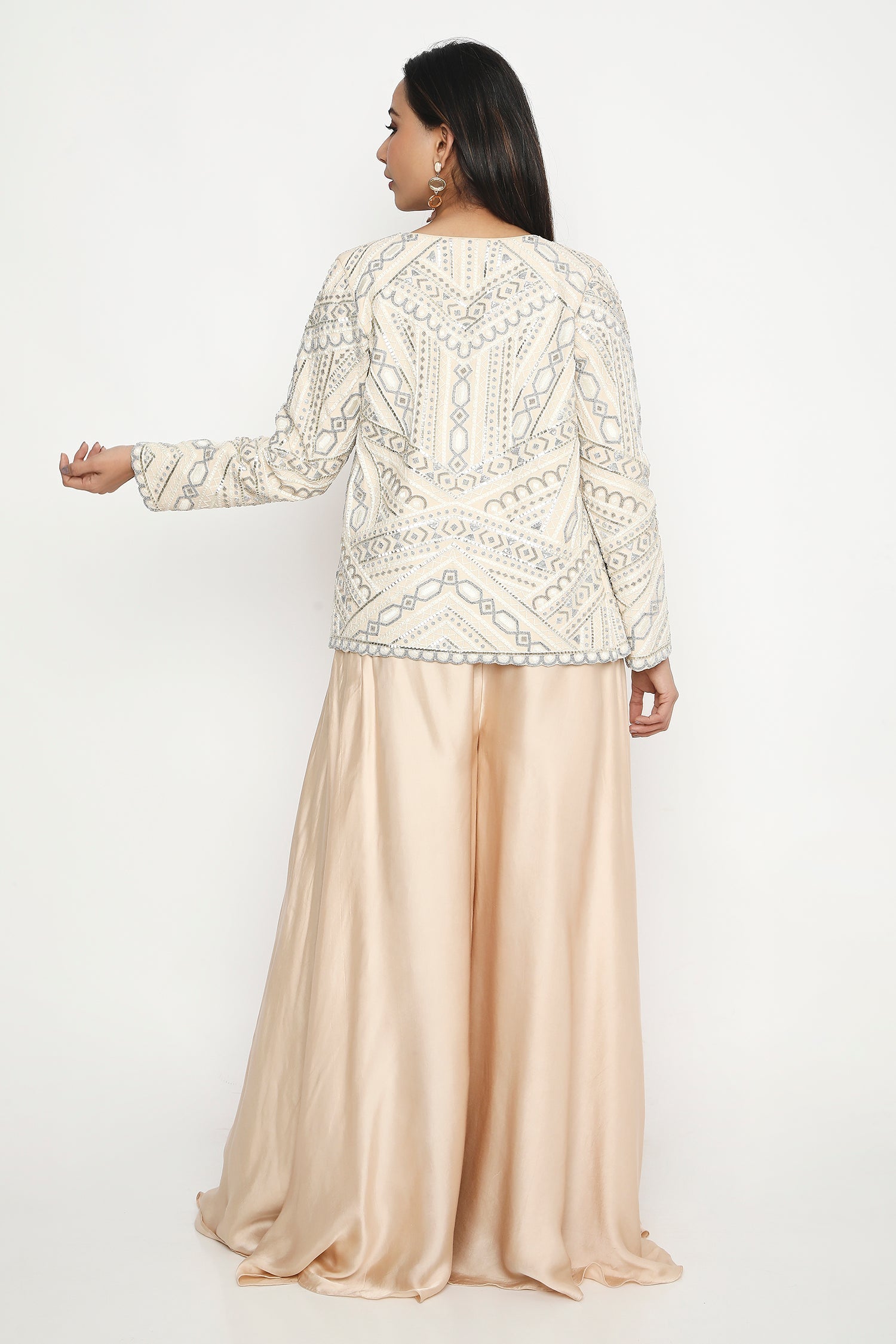 Ivory bead embroidered jacket.