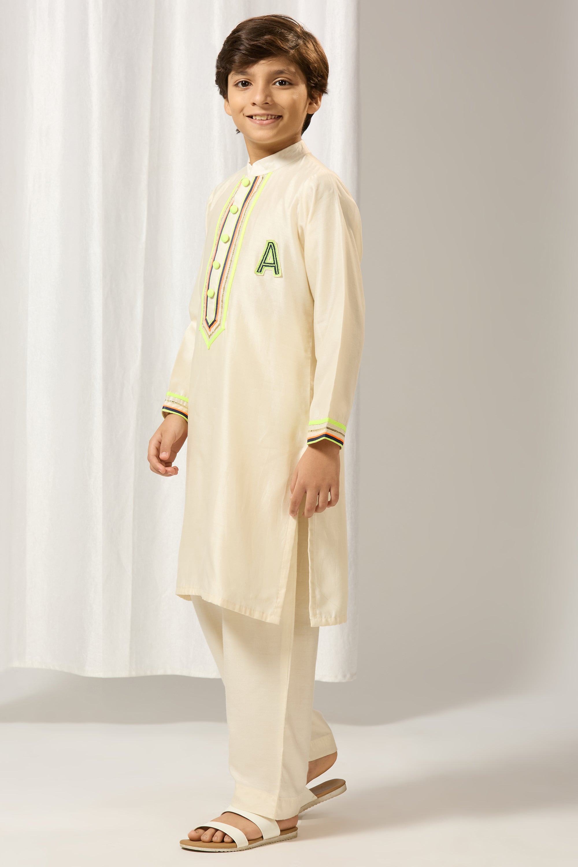 Ivory chanderi gota kurtaset.