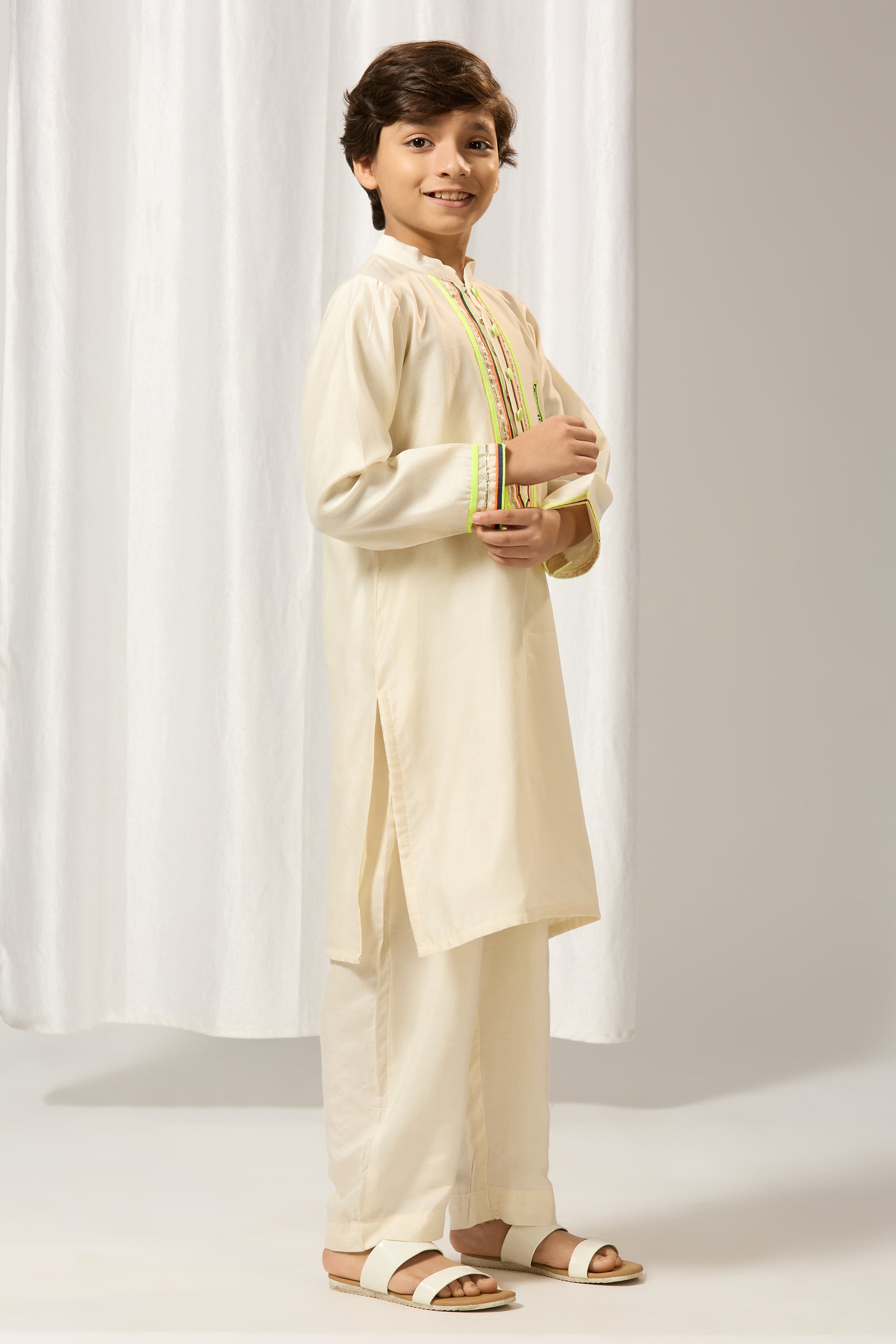 Ivory chanderi gota kurtaset.
