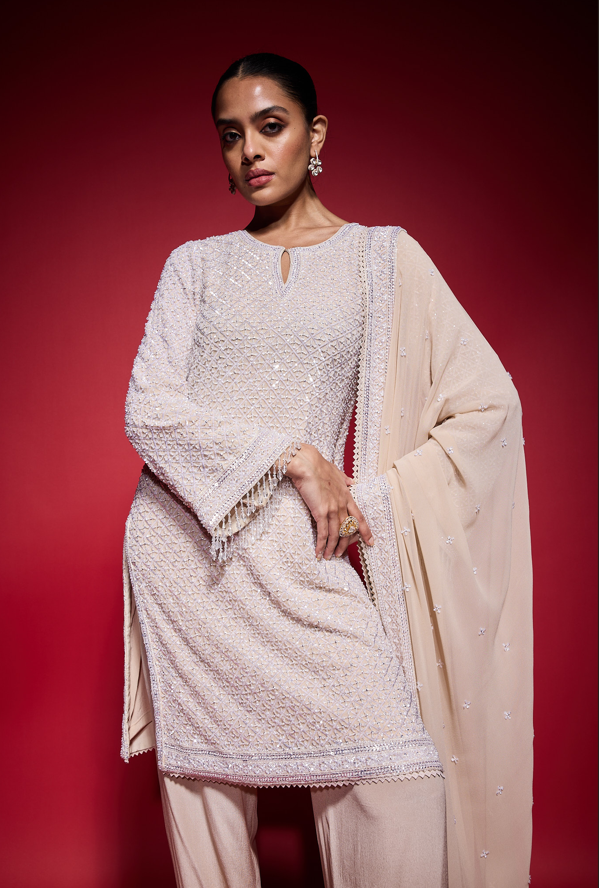 BEIGE ALL OVER SEQUINS KURTASET WITH DUPATTA.