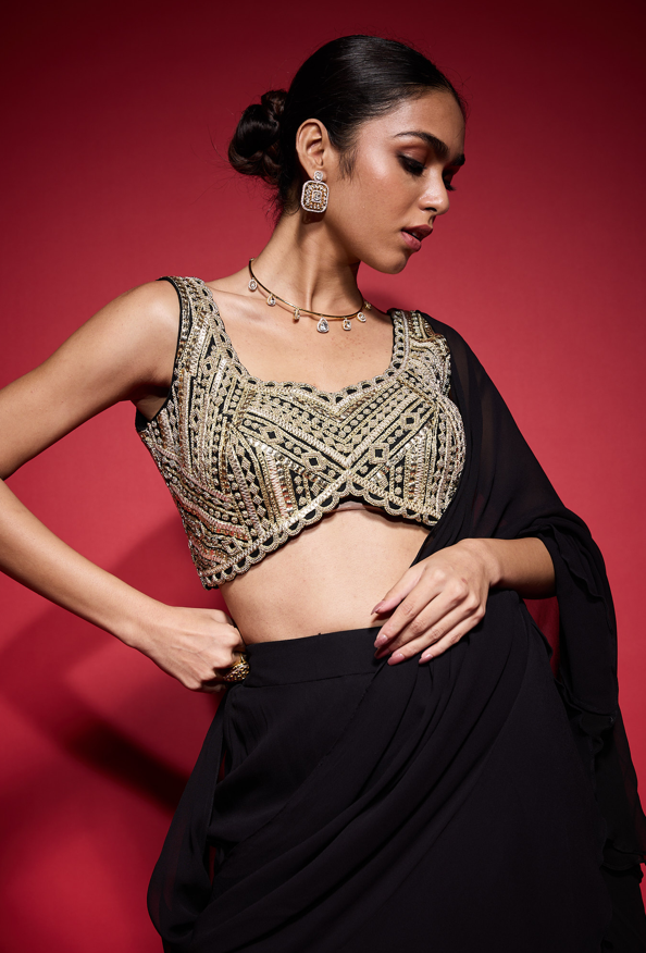 Gold embroidered blouse.
